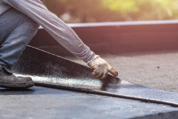 Professional Waterproofing technician working in Darien Center, NY